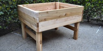 how to build an elevated garden bed table 17