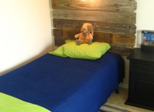 inspiration files--weathered wood headboard with overhead light from southern fried living