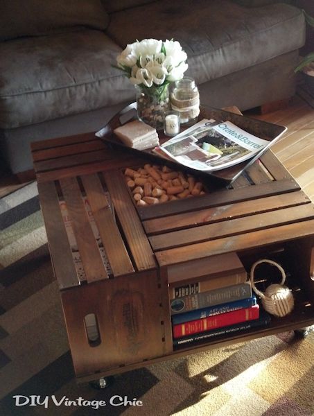 Make a coffee table out of wine crates and casters, from DIY Vintage Chic