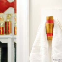 Turn unused croquet mallets into unique towel hooks for your bathroom, and easy DIY project.