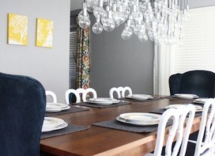 DIY chandelier created with 80 light bulbs and wiring