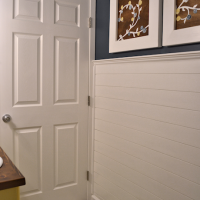 Faux wood plank wall treatment with horizontal slats