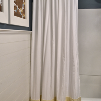 Shower curtain with pleated ruffle accents