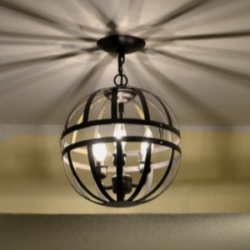 Transform an outdated chandelier into a modern orb pendant light with hanging flower baskets