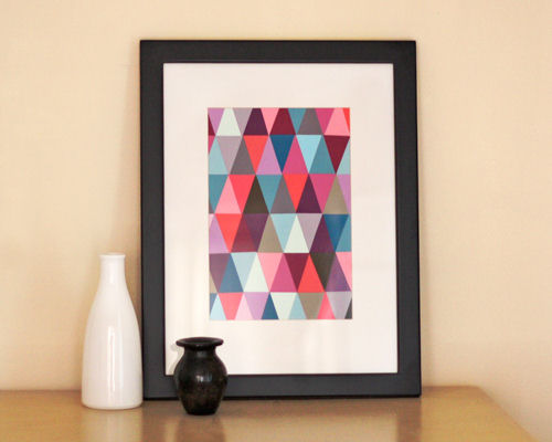 Artwork created with triangles cut from paint chips and adhered side-by-side, from How About Orange