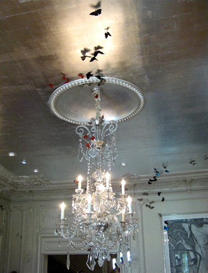 Dramatic ceiling with silver leaf and crystal chandelier