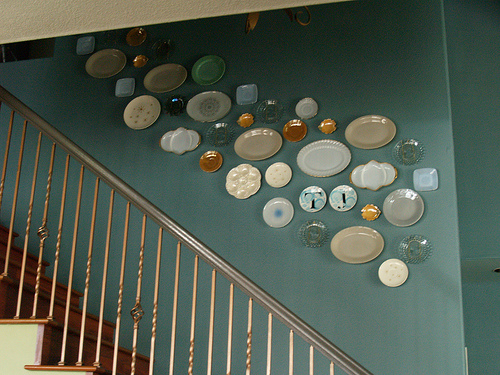 decorative plate wall in stairway