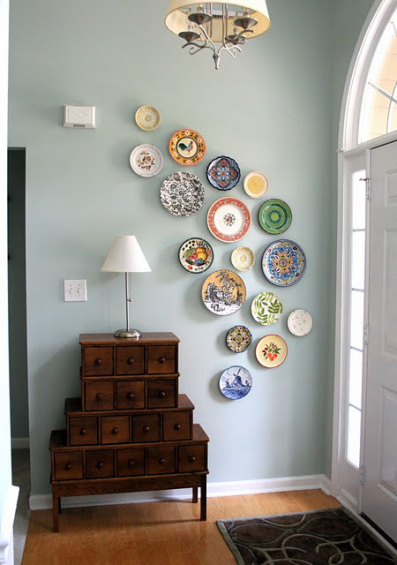 free form decorative plate wall in entryway