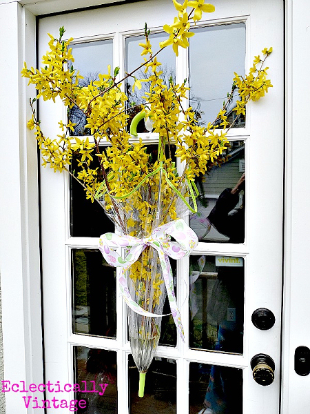 Front Door Decorations For Spring -  Umbrella filled with colorful forsythia