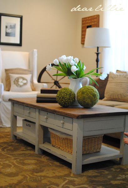 Coffee table makeover from Dear Lillie - after - light blue distressed finish with stained top