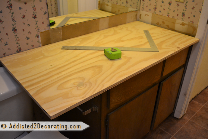 how to make DIY wood countertops out of cedar fence boards - Step 1 - Cut the base out of plywood