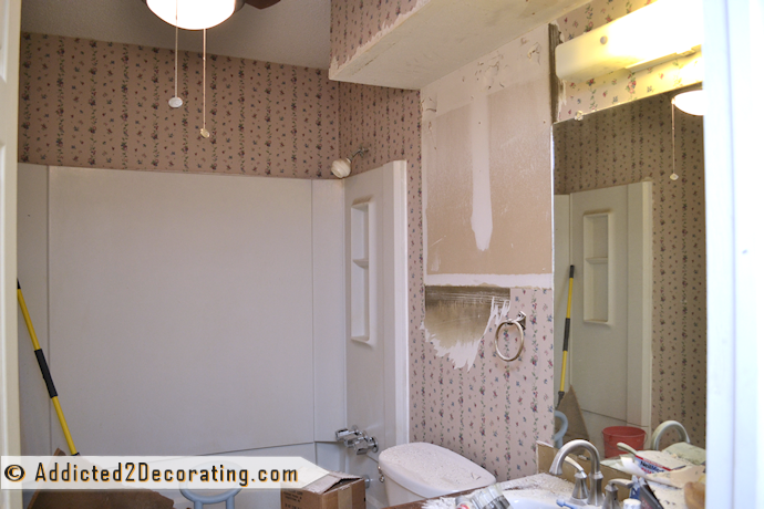 Bathroom makeover - cabinet above the toilet made the room feel so much smaller