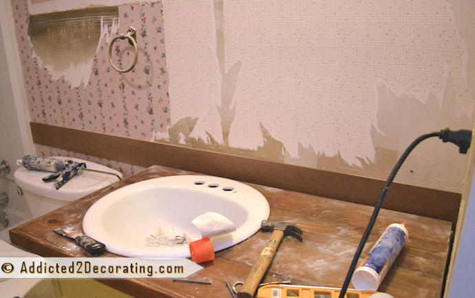 Faux wood plank wall treatment in a bathroom