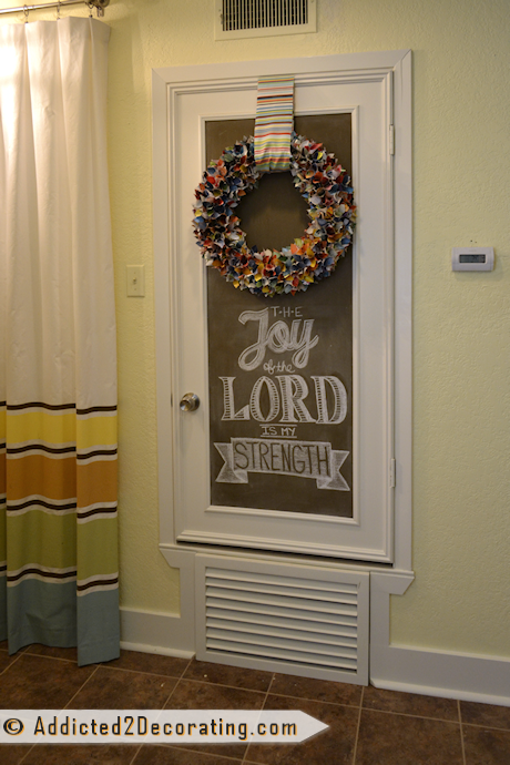 Hallway HVAC door turned into a chalkboard with custom vent made of wood yard sticks