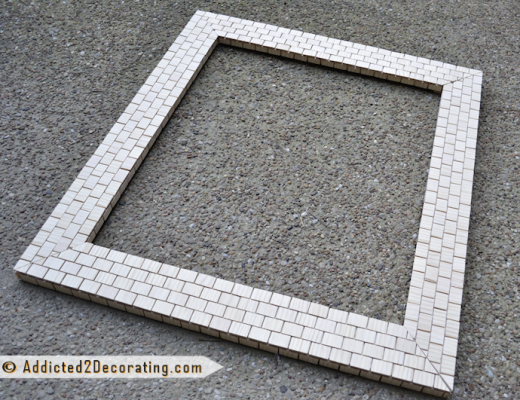 DIY mosaic tile frame made with wood yardsticks