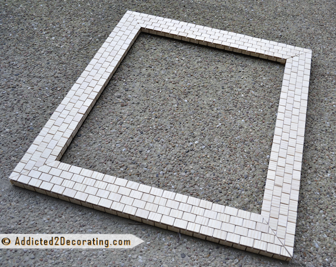DIY mosaic tile frame made with wood yardsticks