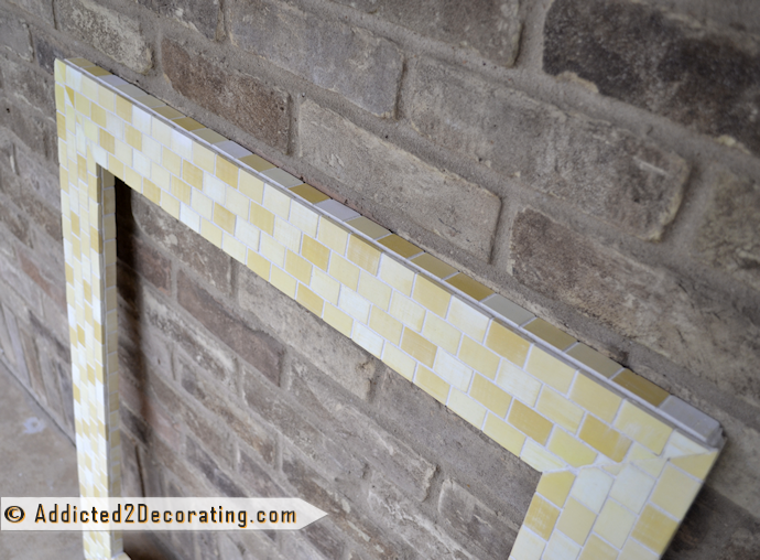 DIY mosaic tile framed bathroom mirror