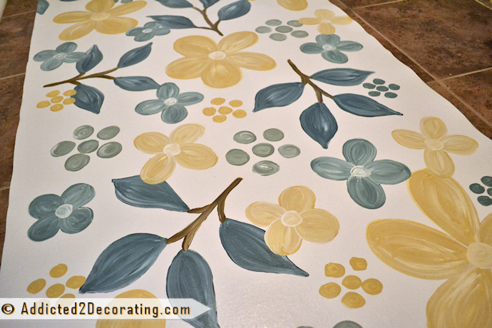 Hand painted floor cloth wth flowers and leaves design