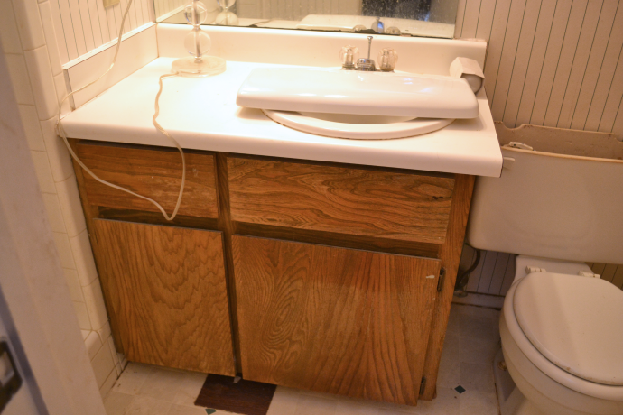 Tiny condo bathroom before makeover - 2