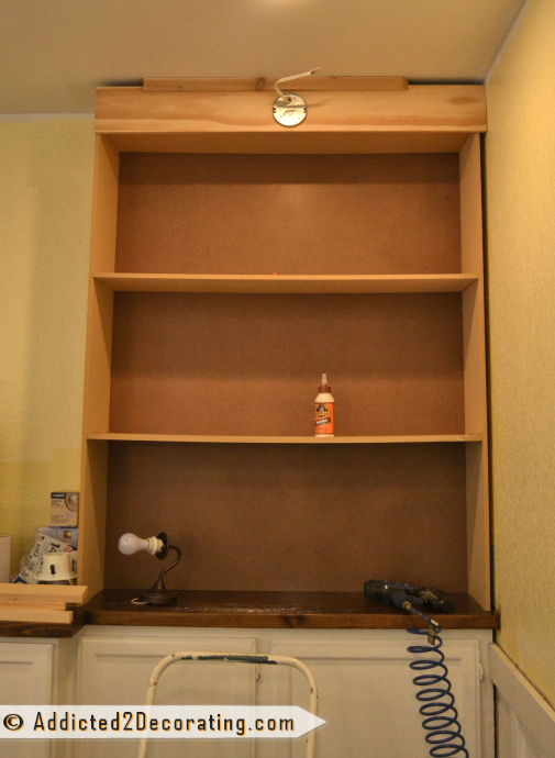 DIY bookcases - header piece with wiring for light