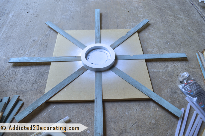 How to make a large multi-colored wood shim sunburst mirror - attach the first row of wood shims