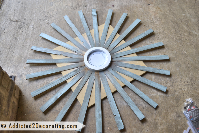 How to make a large multi-colored wood shim sunburst mirror - continue gluing shims on first row