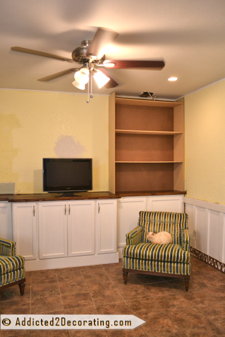 living room progress - bookcases and ceiling fan