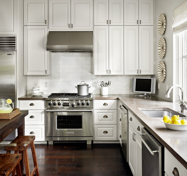 Concrete countertop in white kitchen