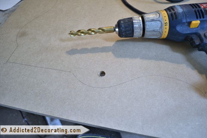 How to make a decorative mirror with scalloped frame - drill a large hole for the jigsaw blade
