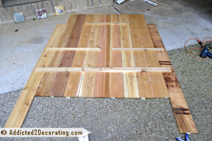 $25 wood headboard made of cedar fence pickets