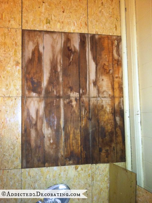 Floor boards underneath vinyl tile (possible asbestos tile)