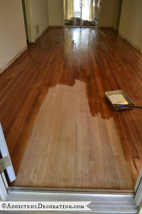 First coat of Waterlox going on the hardwood floors