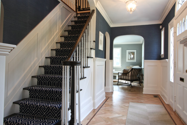 Navy blue and white entryway by Michael Robert Construction, via Houzz