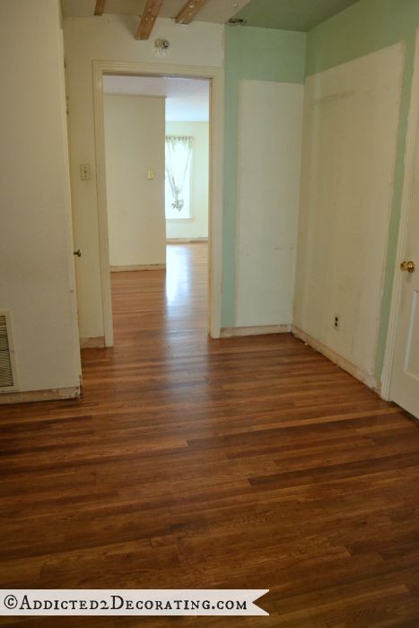 Hallway with 65-year-old hardwood floors refinished, and closet added in the 70s removed