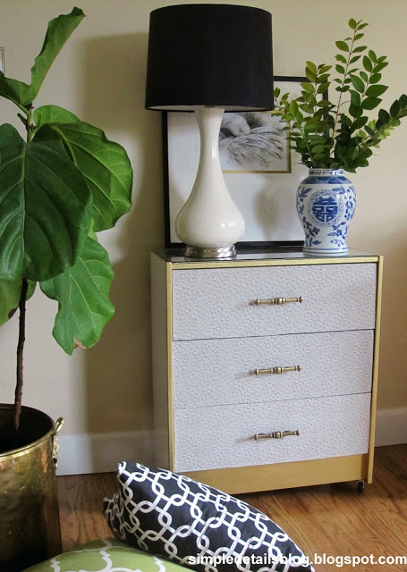 IKEA Rast hack from Simple Details - covered in faux ostrich with gold details