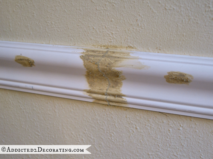 tips for installing beautiful moulding - use wood filler on the face of the trim