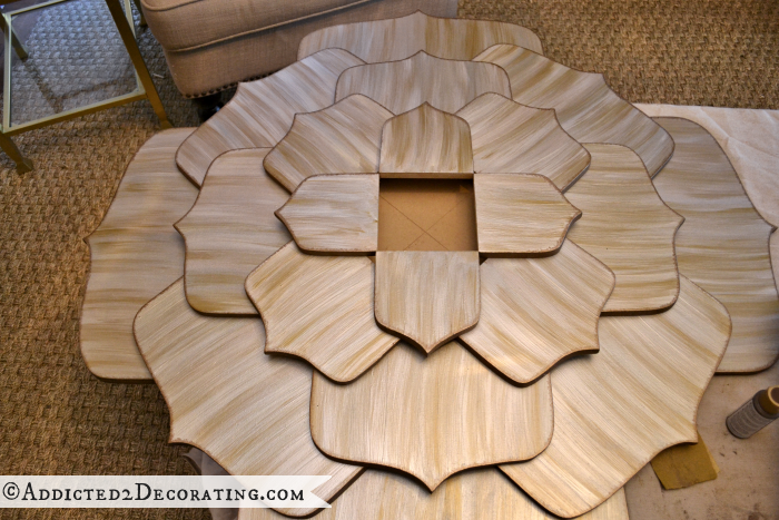 Metallic lotus flower mirror - step 15 - add the fifth row of flower petals using wood glue