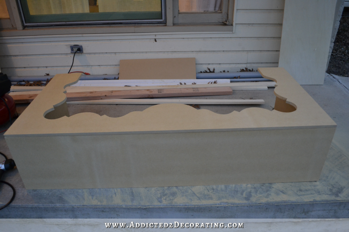 DIY scalloped console table - attach the scalloped piece to the top and sides