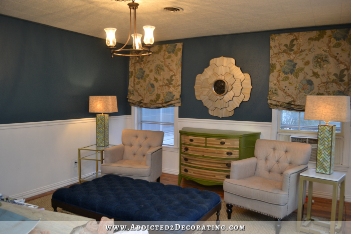 Living room walls painted with a teal color called Mythic Forest from Behr