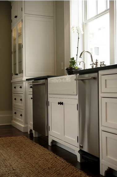 kitchen cabinets with decorative feet from plantation building corp, via houzz