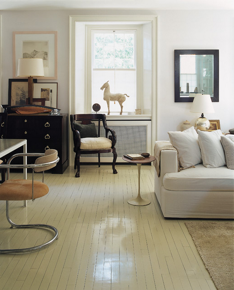 Painted hard wood floor in a living room, solid white floor, via Houzz.com