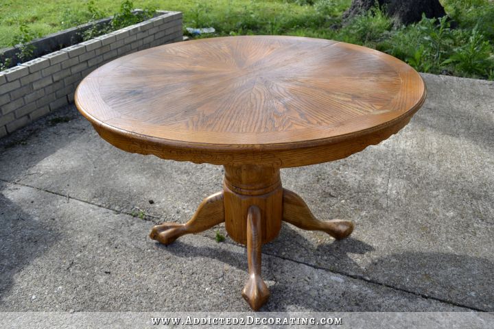 Old oak dining table in need of a makeover -- very pretty oak veneer design on the round top
