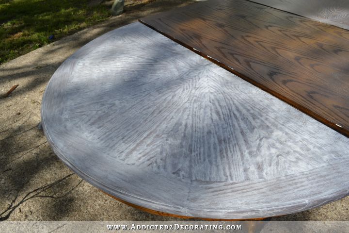 Oak table top covered in liming wax during cerusing process