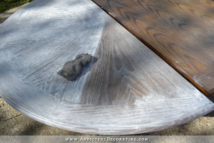 Remove excess liming wax from oak table top to achieve cerused look