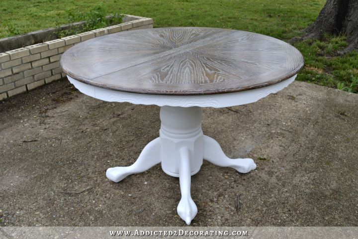 Dining table after DIY makeover -- cerused oak top with painted white pedestal base