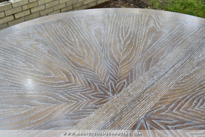 Dining table with cerused oak top -- brown stain with white grain