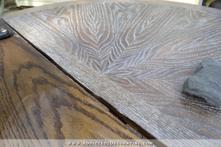 In progress picture of oak dining table top being cerused -- medium brown stain with white grain to accent the pattern.