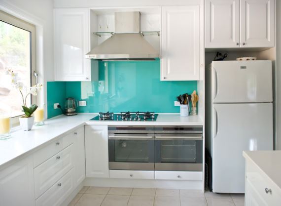 Kitchen with turquoise back painted backsplash, via Houzz.com