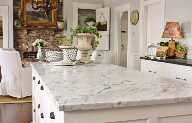 Marble countertops in farmhouse kitchen, from For The Love Of A House blog