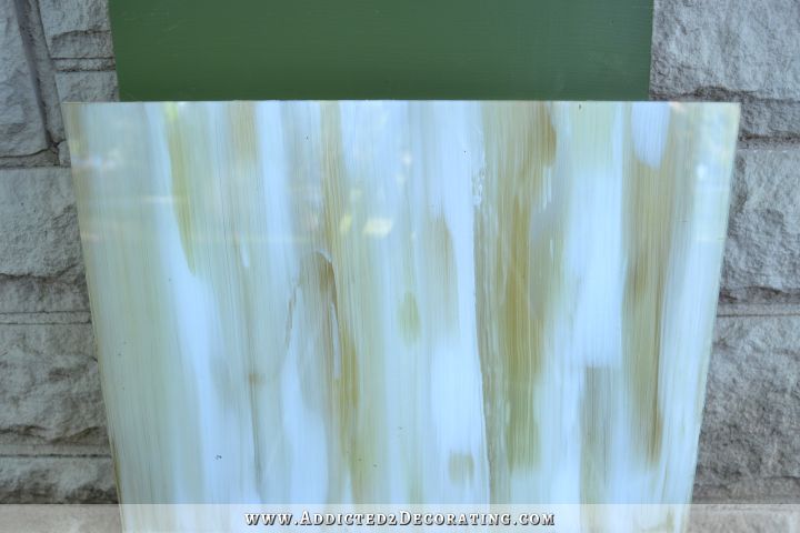 Using glass produces a super shiny effect that will look great for a backsplash.